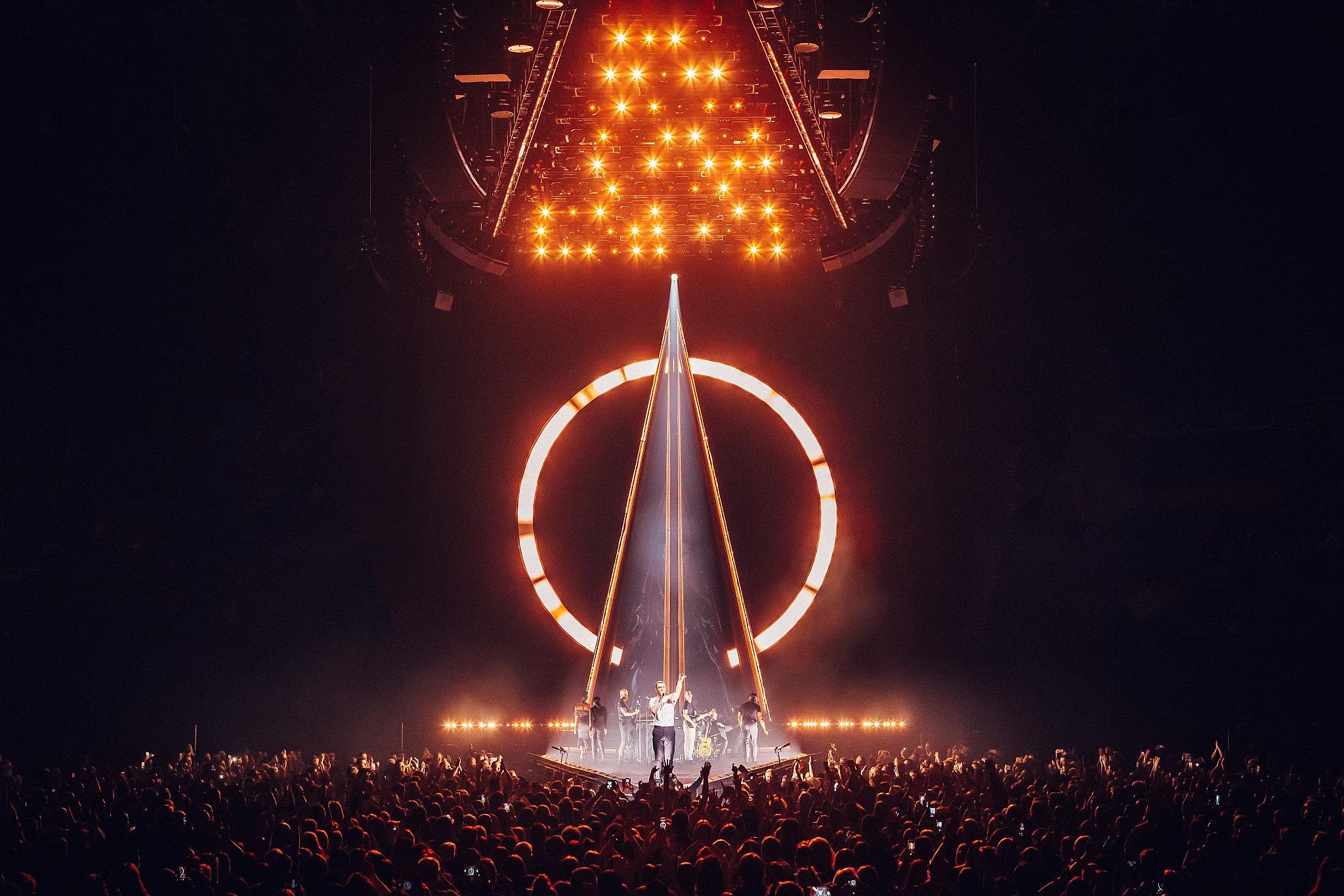 Sam Smith — orange ring and triangular light frame